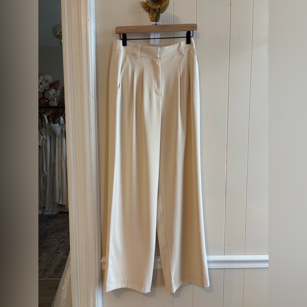 High rise tailored trousers. New with tags. Ivory